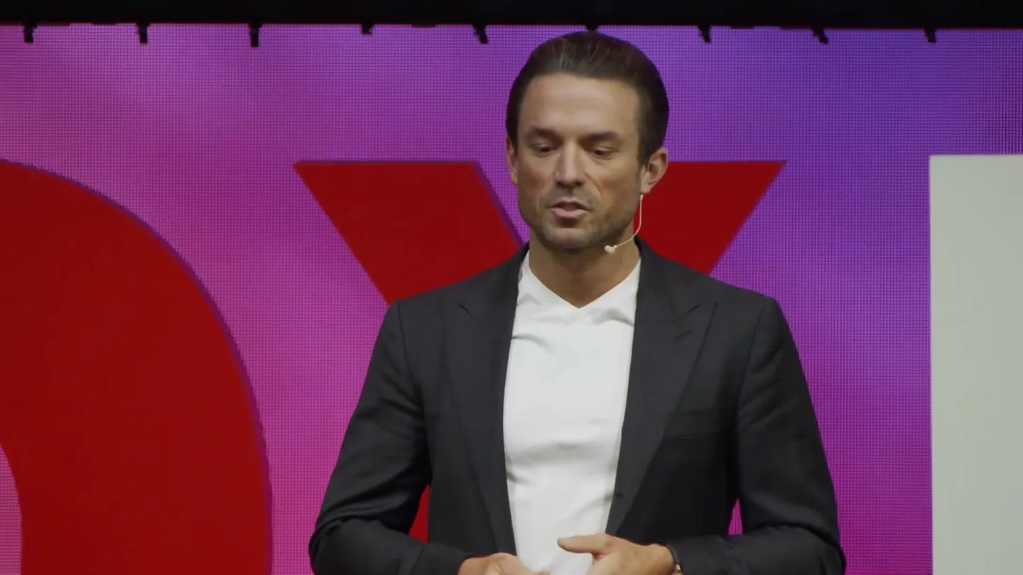 Patrick Frank speaking on the TEDx stage